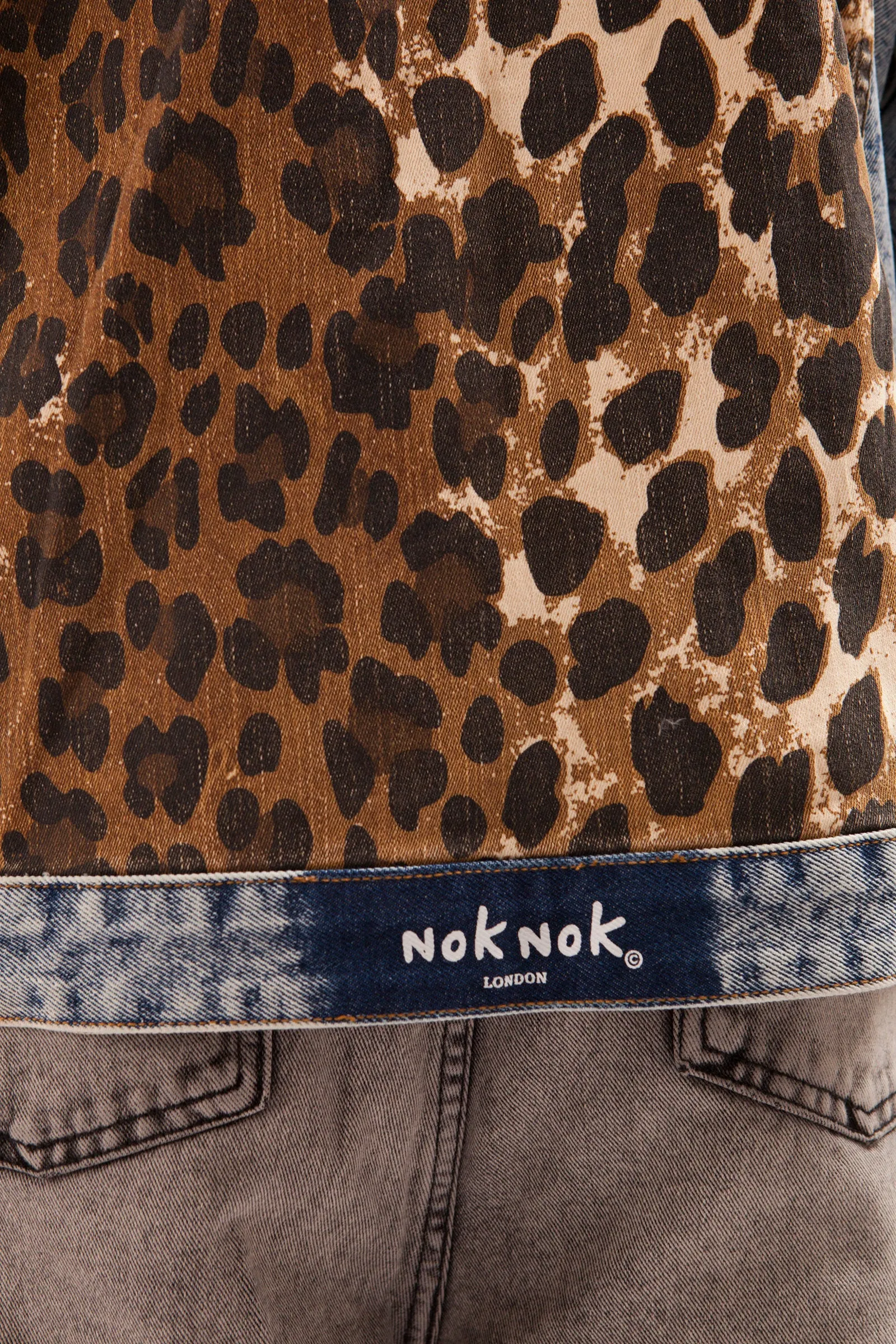 PSYCHO LOVER- VINTAGE WASH OVERSIZED DENIM TRUCKER JACKET WITH LEOPARD PRINTED PANNELS